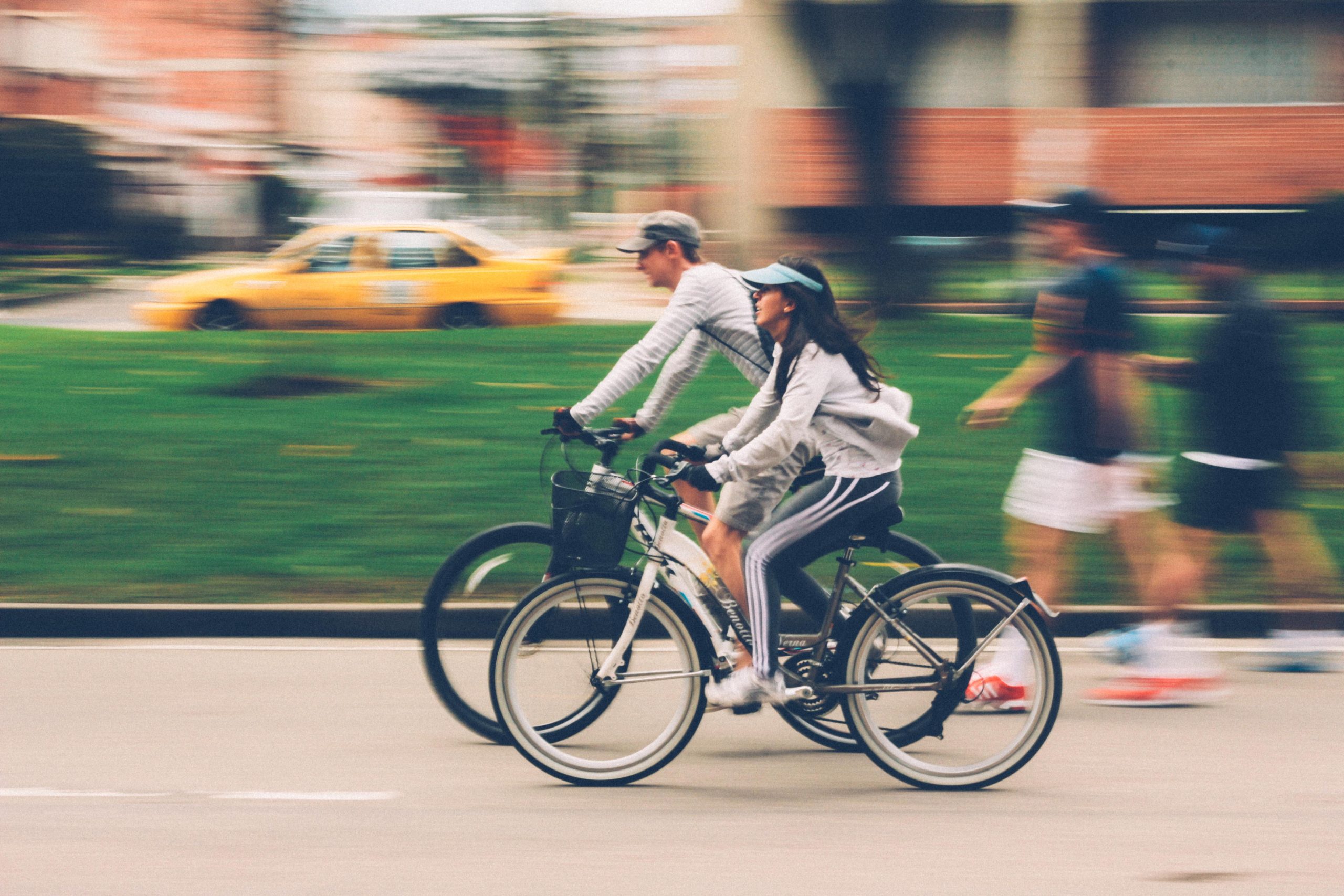 Young couple riding their bikes